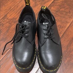 Dr. Martens Black Leather Platform Shoes with Yellow Stitching